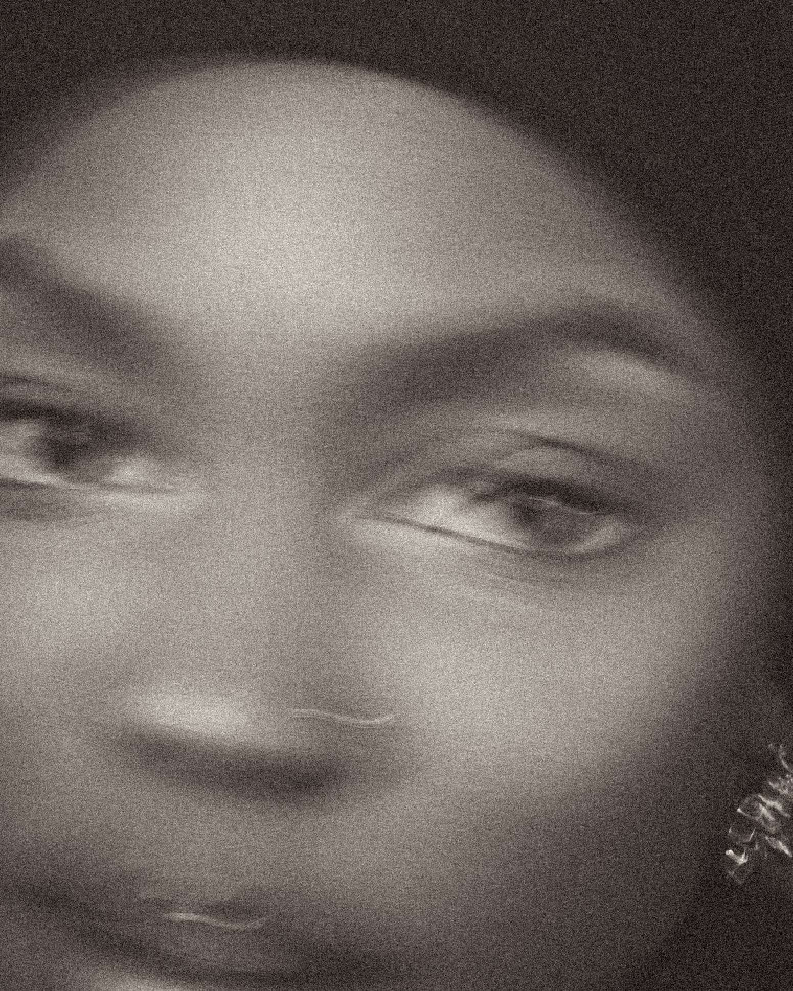 A blurred black-and-white close-up of Kristen’s face, from Deun Ivory’s portraits of Kristen for VSCO